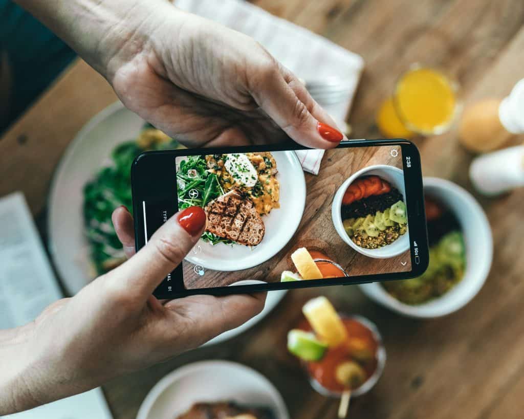 Person enjoying a healthy meal as part of a nutrition coaching program in San Luis Obispo